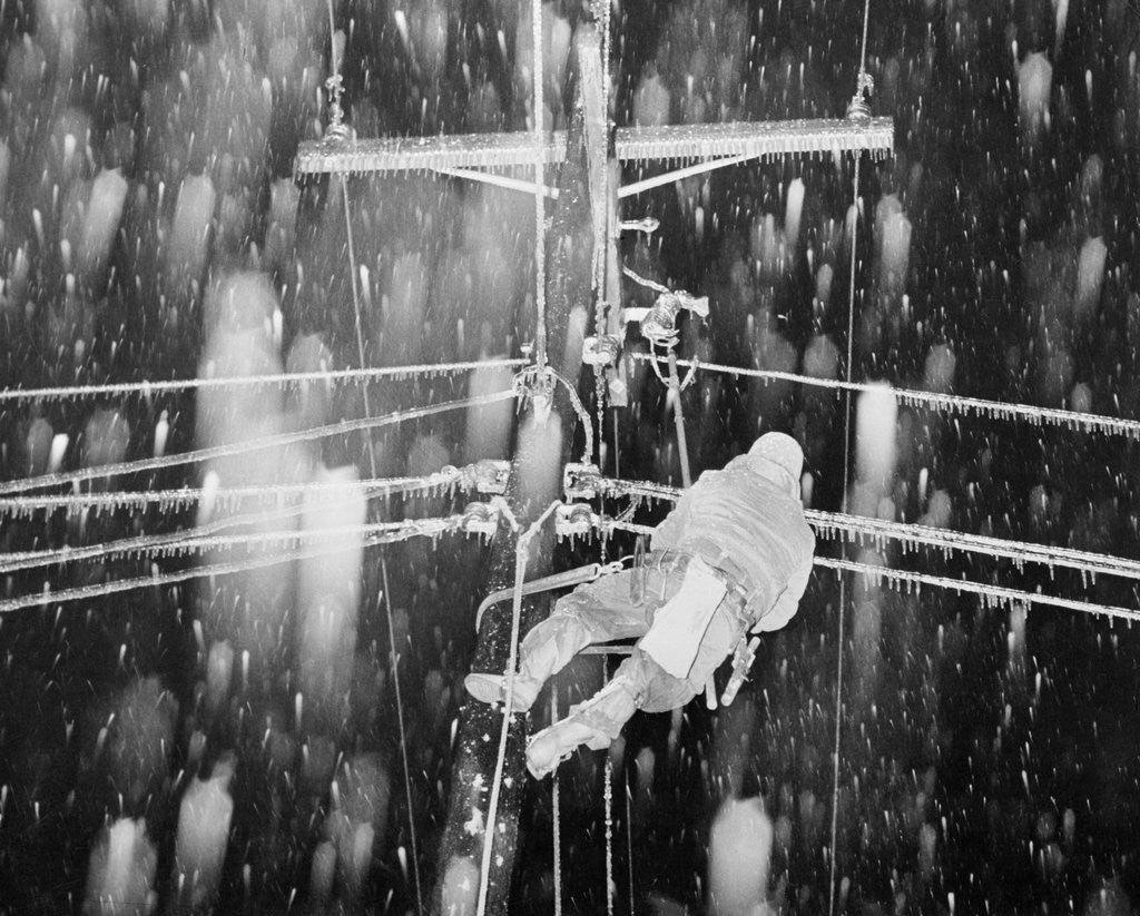 Detail of Man Repairing Utility Line in Snowfall by Anonymous