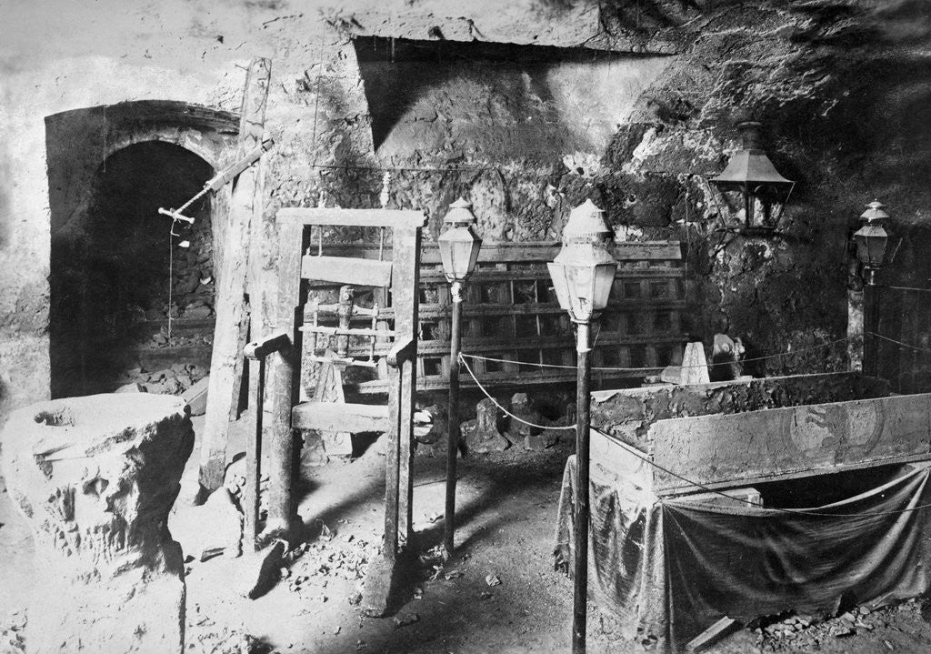 Detail of View of Torture Equipment in Cave Like Setting by Corbis