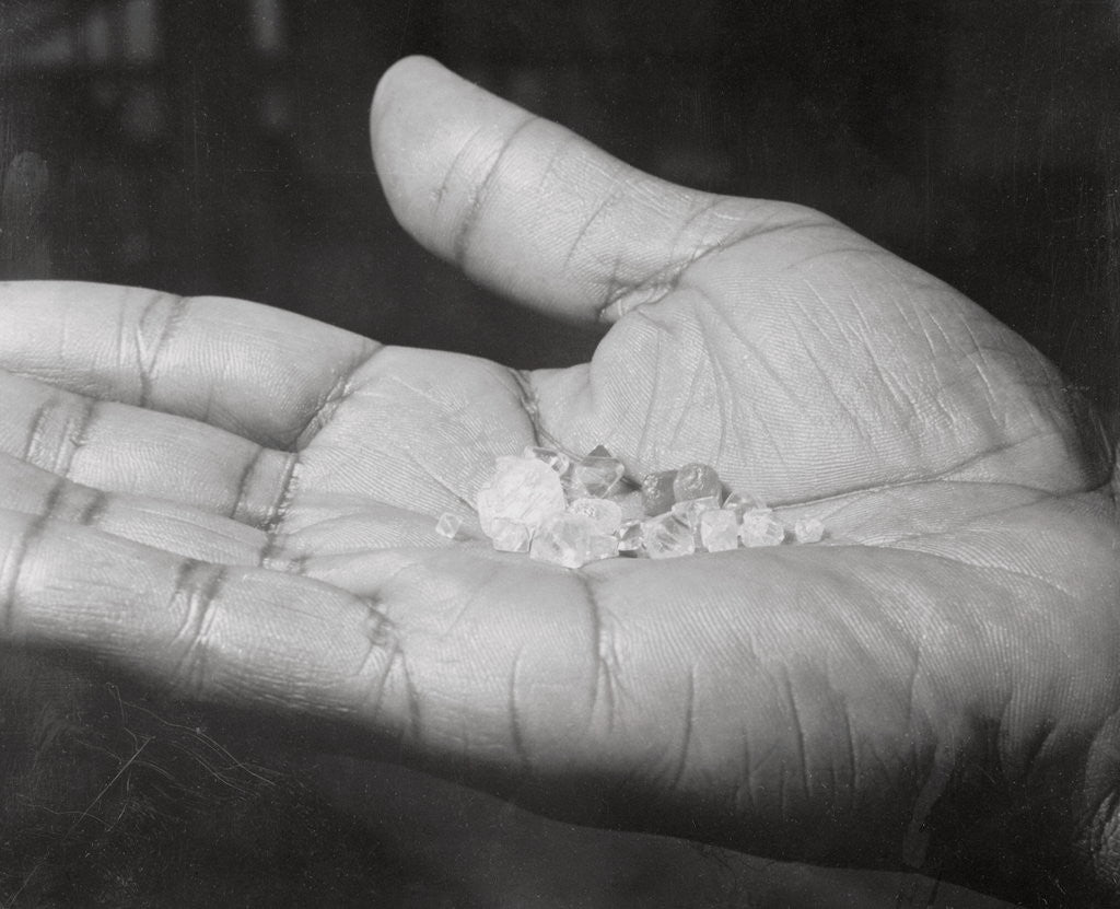 Detail of Close up of Hand Holding Diamonds by Anonymous