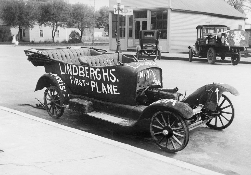 Detail of Early Model Car Parked at Station by Anonymous