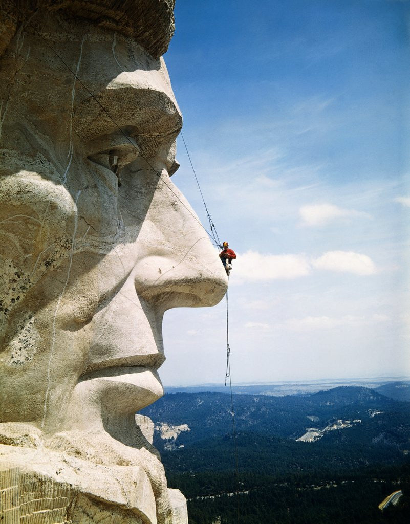 Detail of Mount Rushmore Repairman Working on Lincoln's Nose by Anonymous