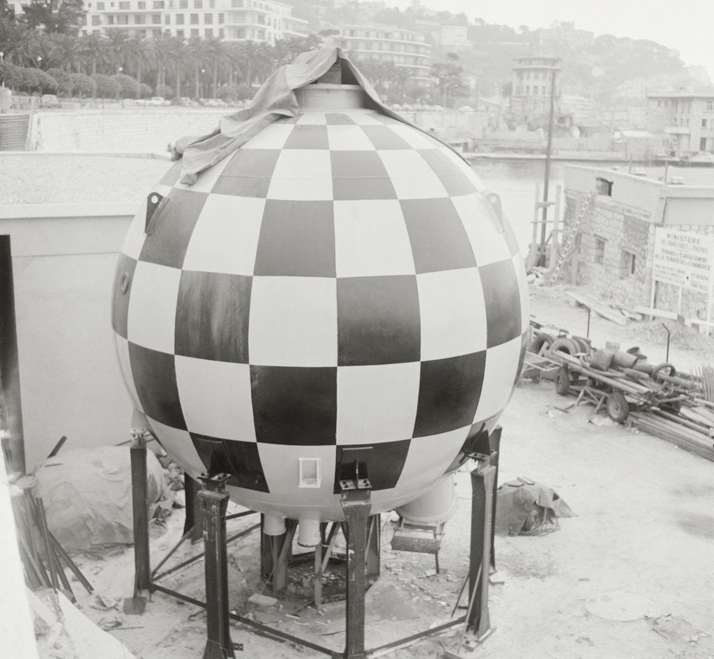Detail of Checkered Steel Sphere Resting on Platform by Corbis
