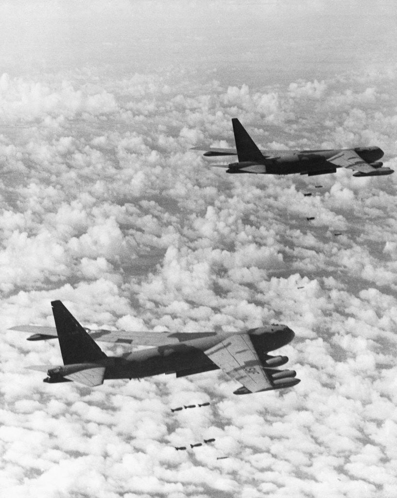 Detail of Military Airplane Dropping Bombs in Vietnam by Corbis