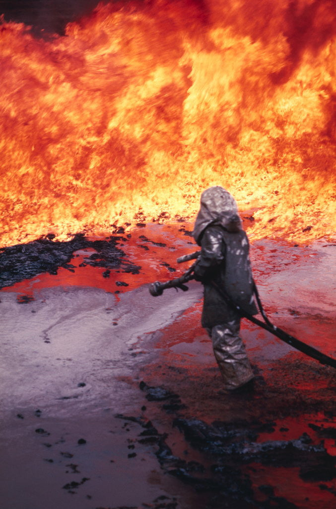 Detail of Firefighter Trying to Extinguish an Aviation Fire by Anonymous