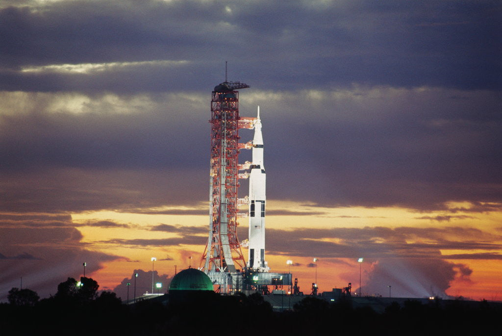 Detail of Apollo 17 and Launch Pad with Sunrise by Corbis
