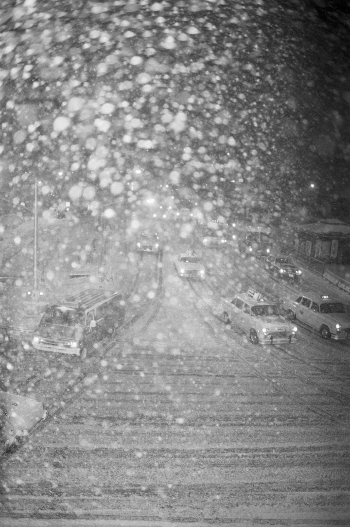 Detail of Traffic Slowly Moving Through Snow by Anonymous