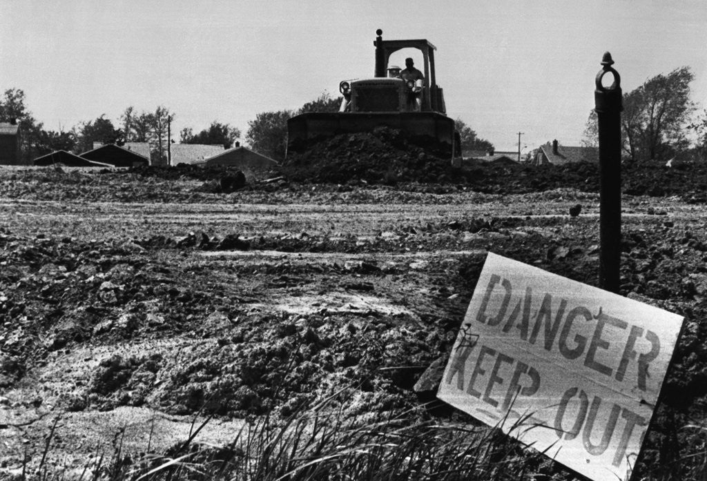 Detail of Danger Sign in Love Canal Lot by Corbis