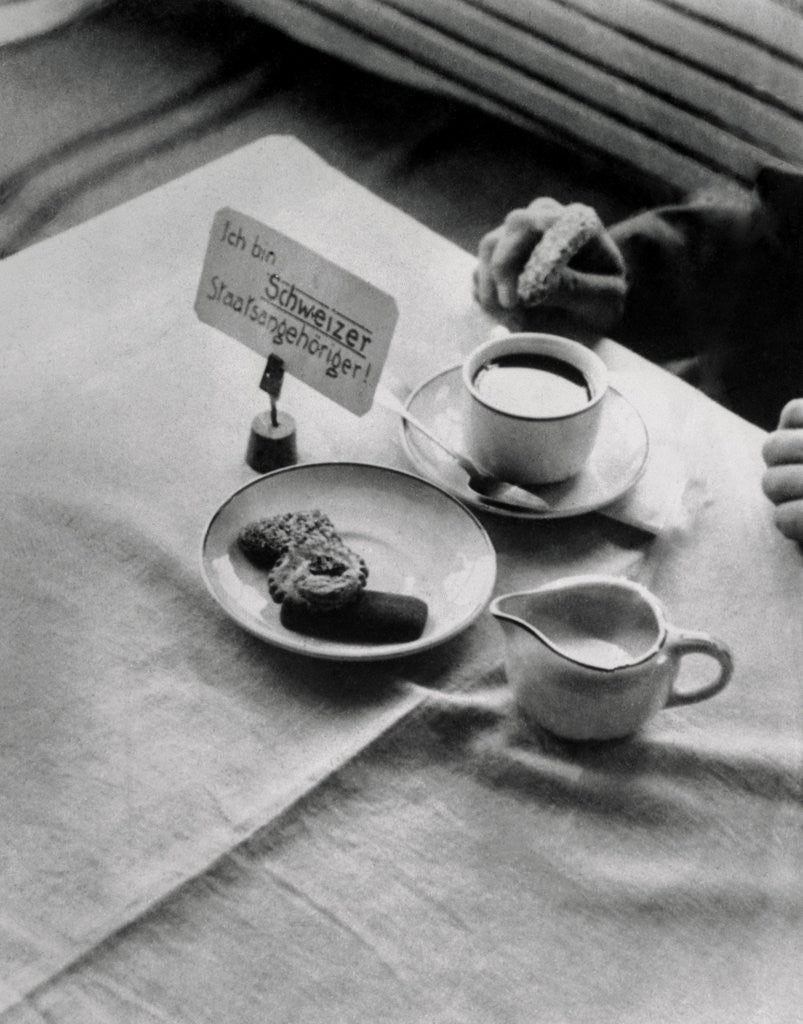 Detail of A Placard Being Placed on a Table by Anonymous