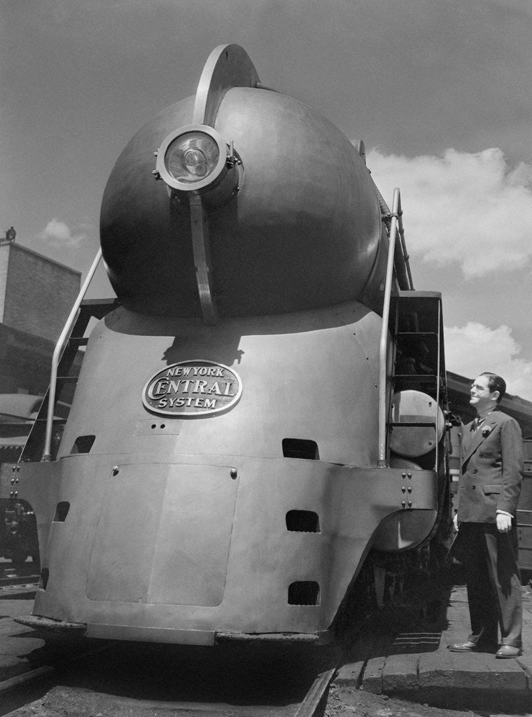 Detail of Inventor Standing by His Train Model by Anonymous
