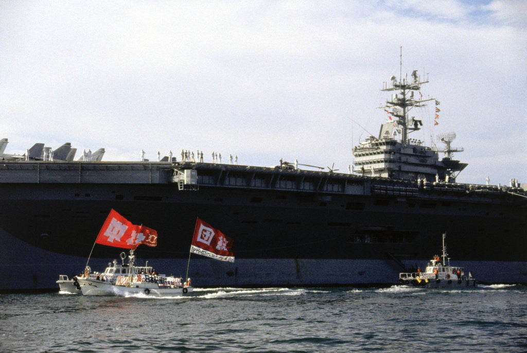 Detail of Ship and Boats with Flag Carriers Against the Nuclear Vessel by Anonymous