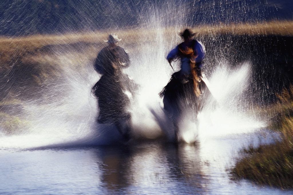 Detail of Cowboys Riding Horses Through River by Anonymous