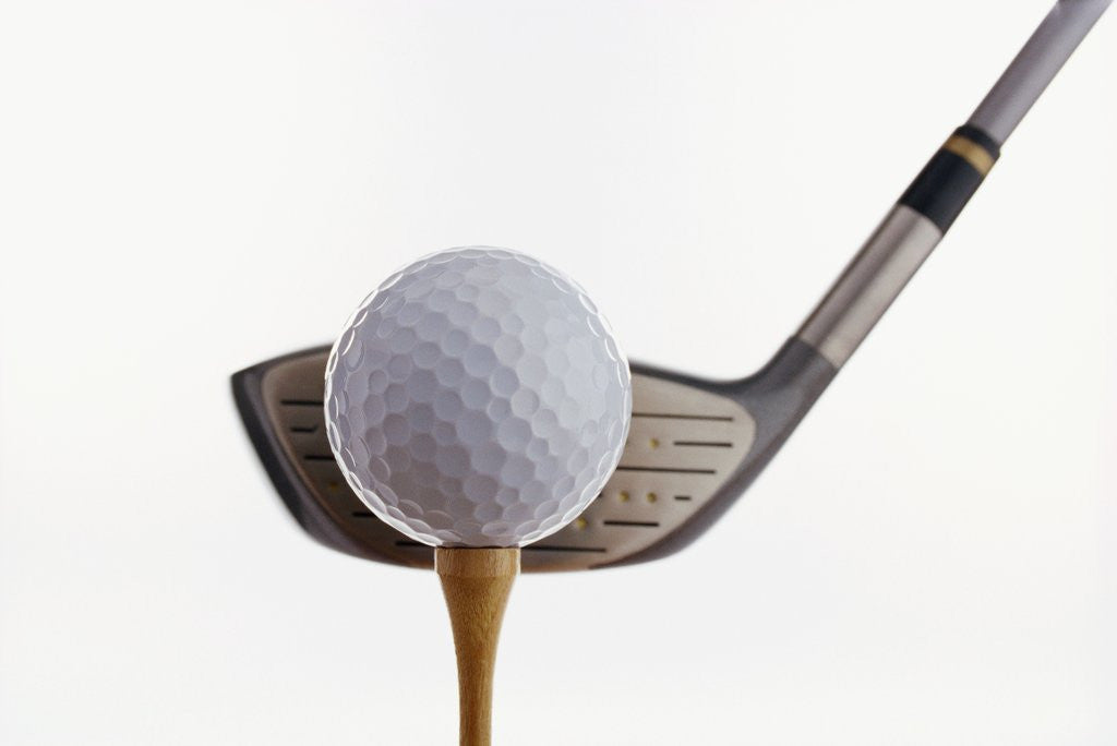 Detail of Golf Ball, Tee, and Club by Corbis