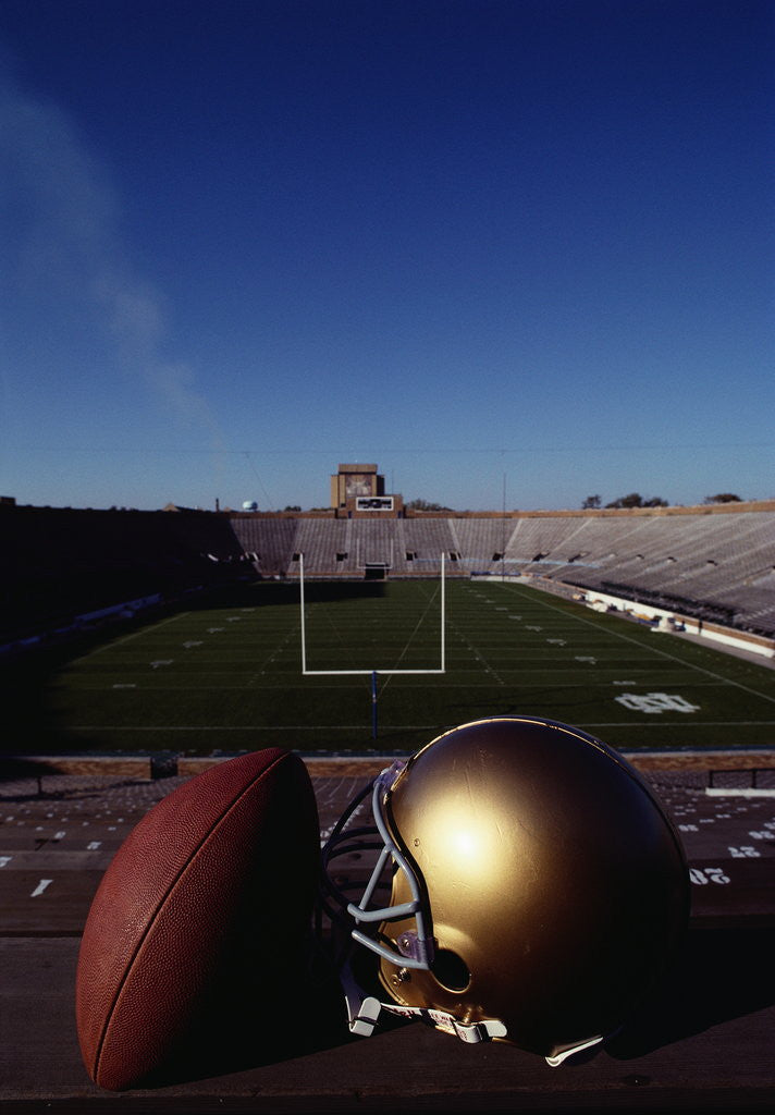 Detail of Notre Dame Football Helmet and Football at Notre Dame Stadium by Corbis