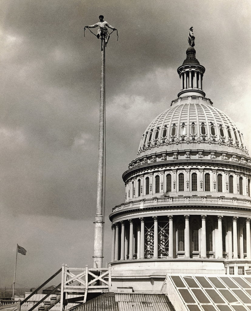 Detail of Man Sitting Near Dome of Capitol by Anonymous