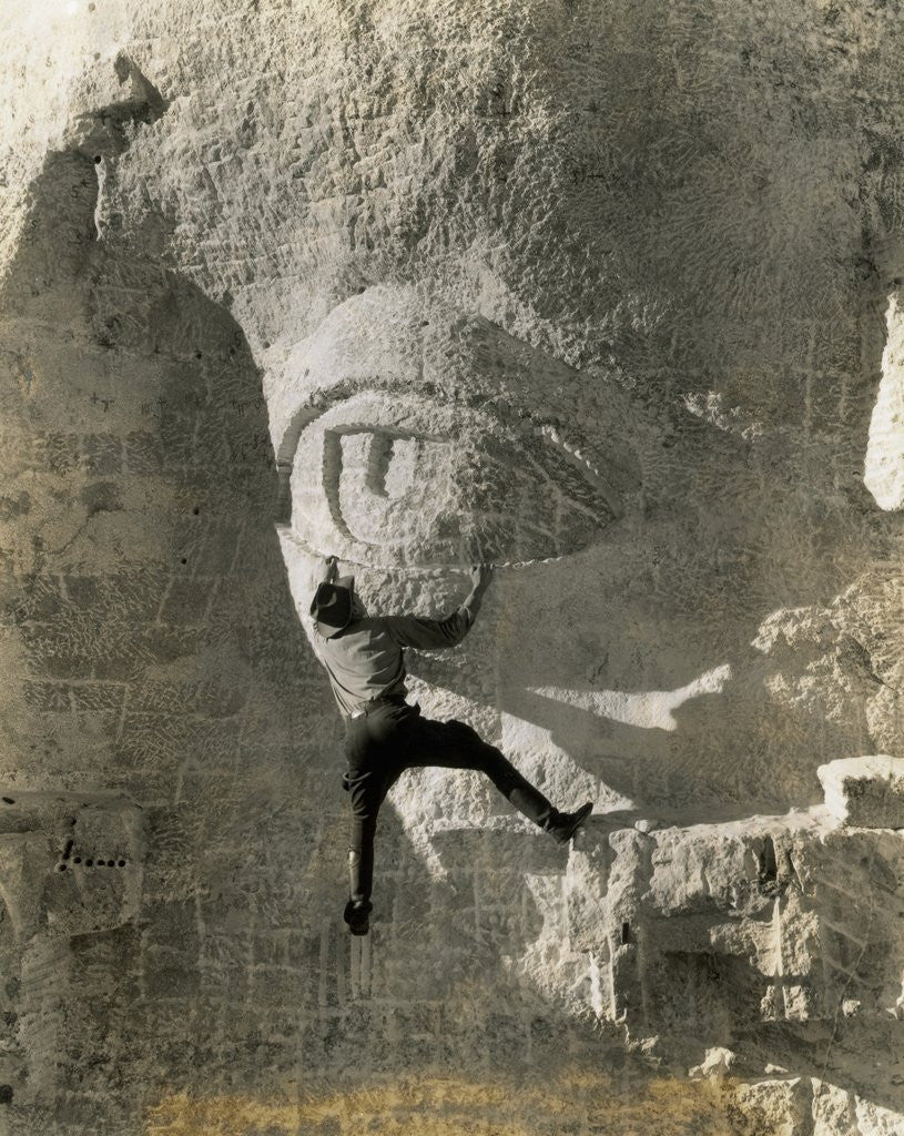 Detail of Man Hangs Onto Eye at Mount Rushmore by Anonymous