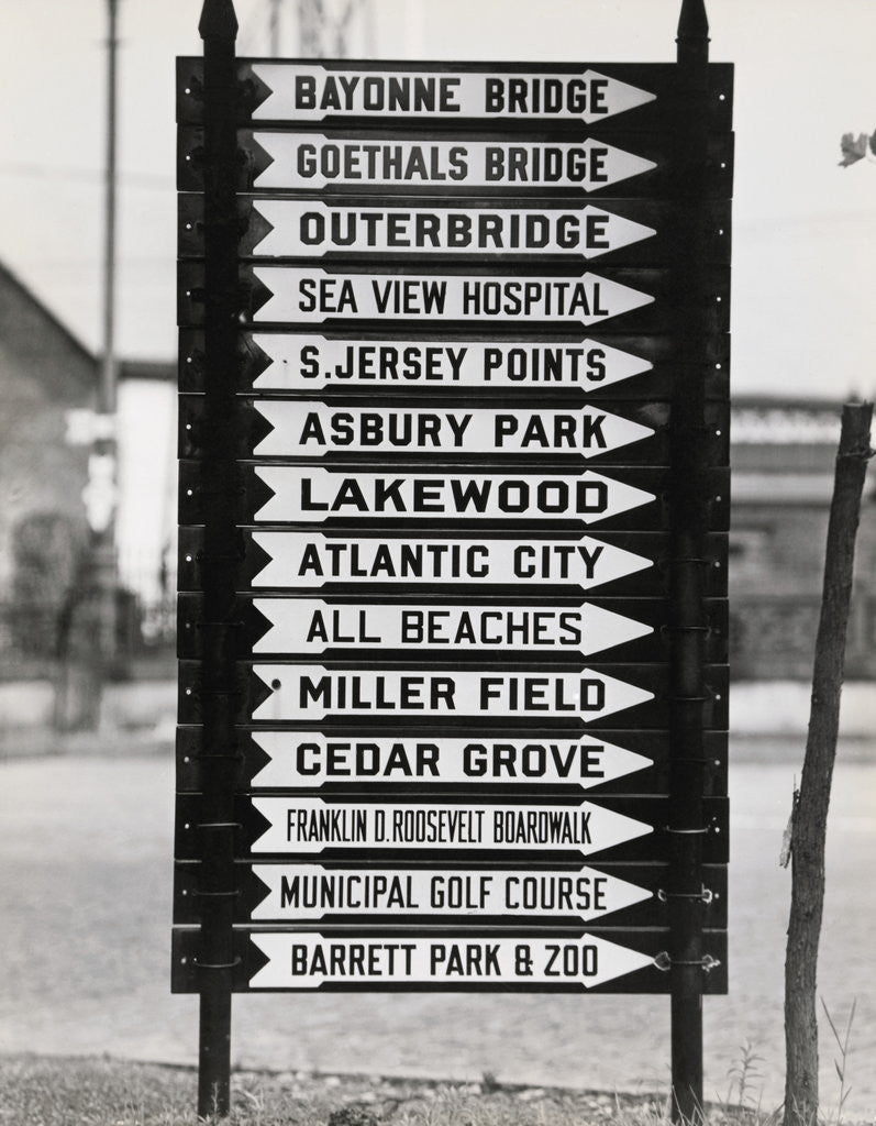 Detail of Signboard with Many Signs by Corbis