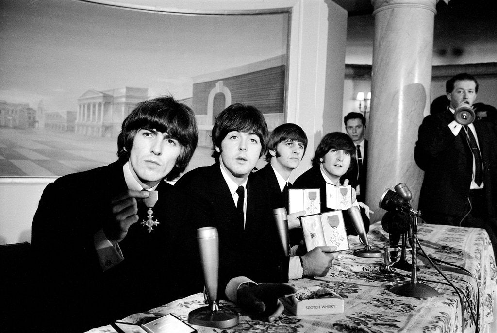 Detail of The Beatles pose with their MBEs by Gavin