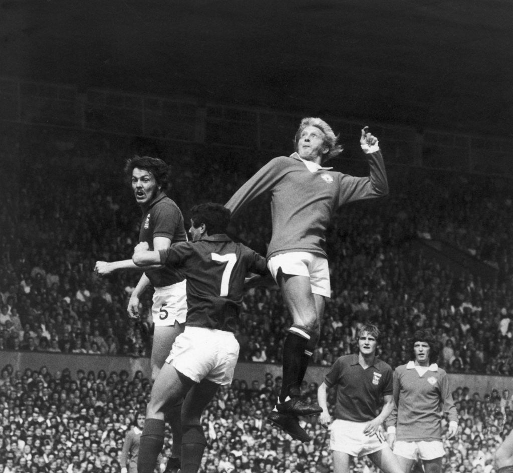 Detail of Denis Law seen here in action against Ipswich at Old Trafford by Staff