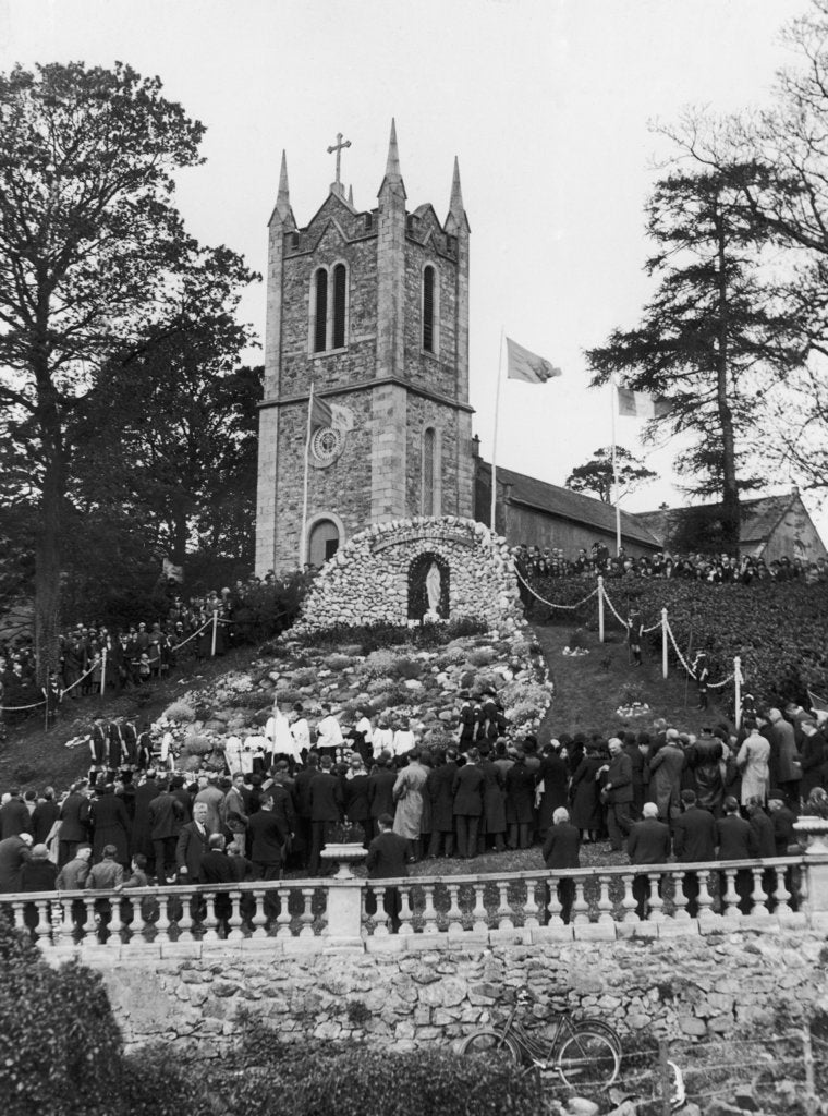 Detail of The Rosary being reunited at the foot of the wayside grotto of Our Lady of Lourdes by Staff