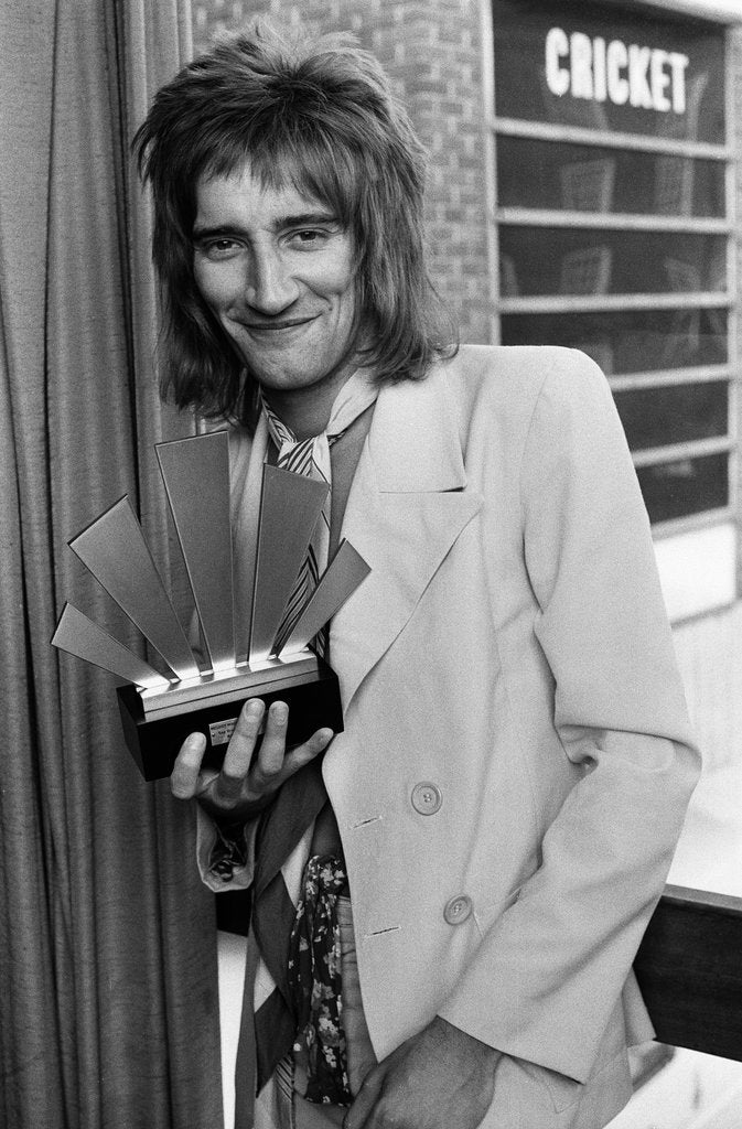 Detail of Rod Stewart with his Top Male Singer Award by Staff