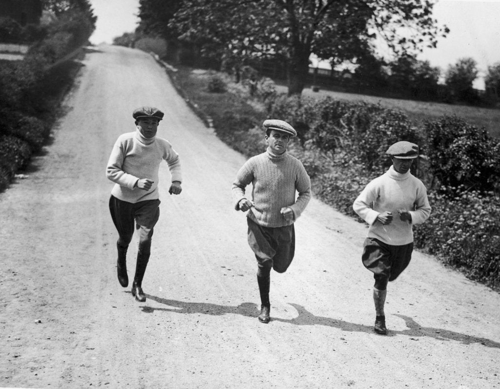 Detail of Apprentice jockeys jogging down a country lane by Staff