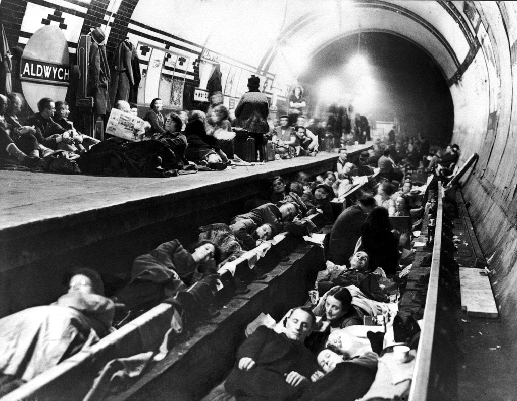 Detail of Londoners use Aldwych Underground Station as an air raid shelter by Staff