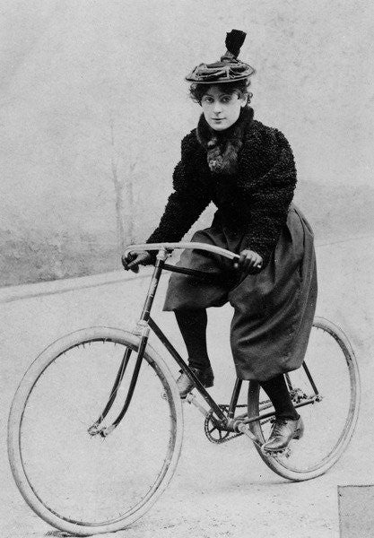 Detail of Woman on a bicycle by French Photographer